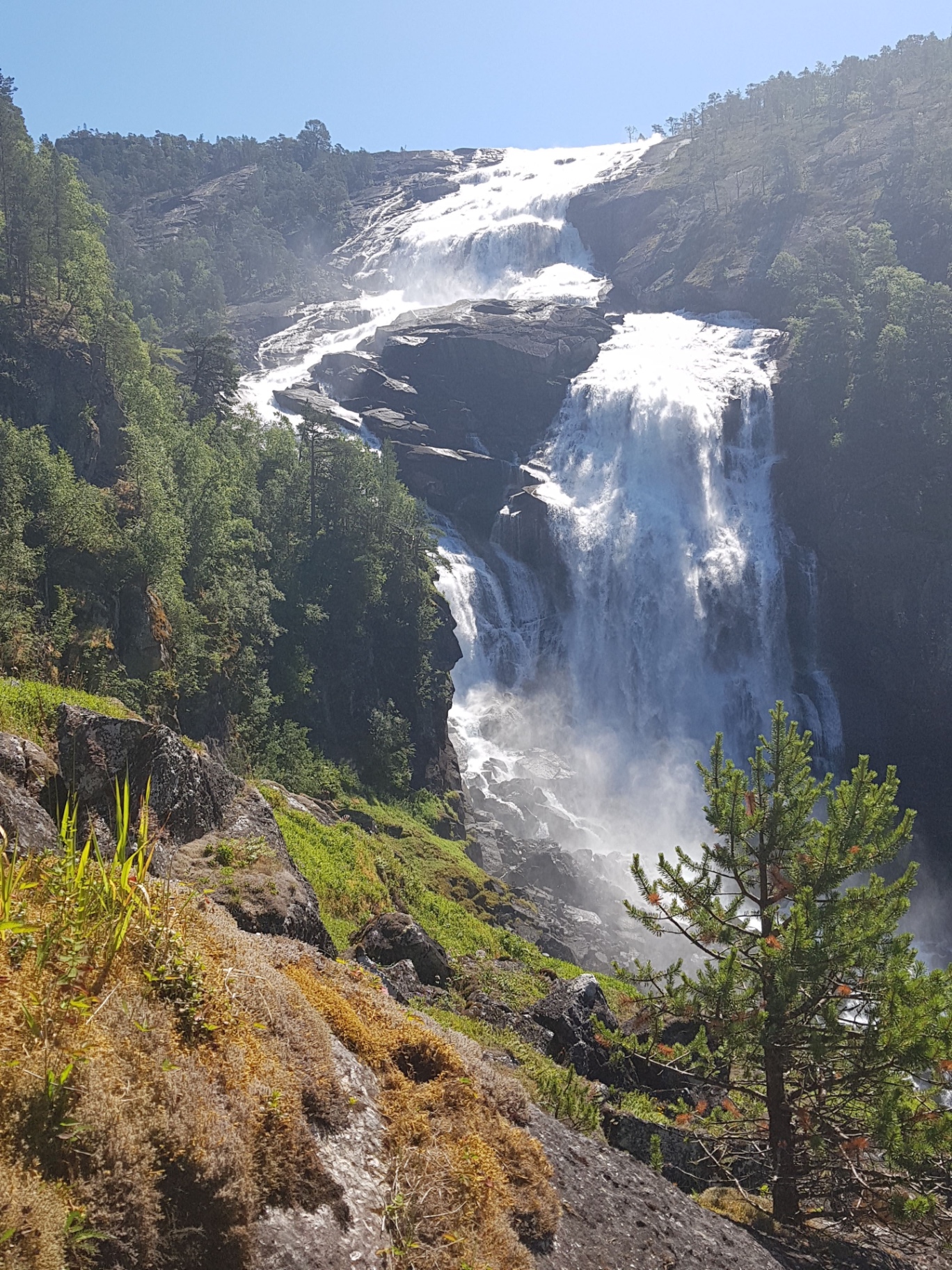 Norwegian waterfall in a fjord landscape near Haugesund